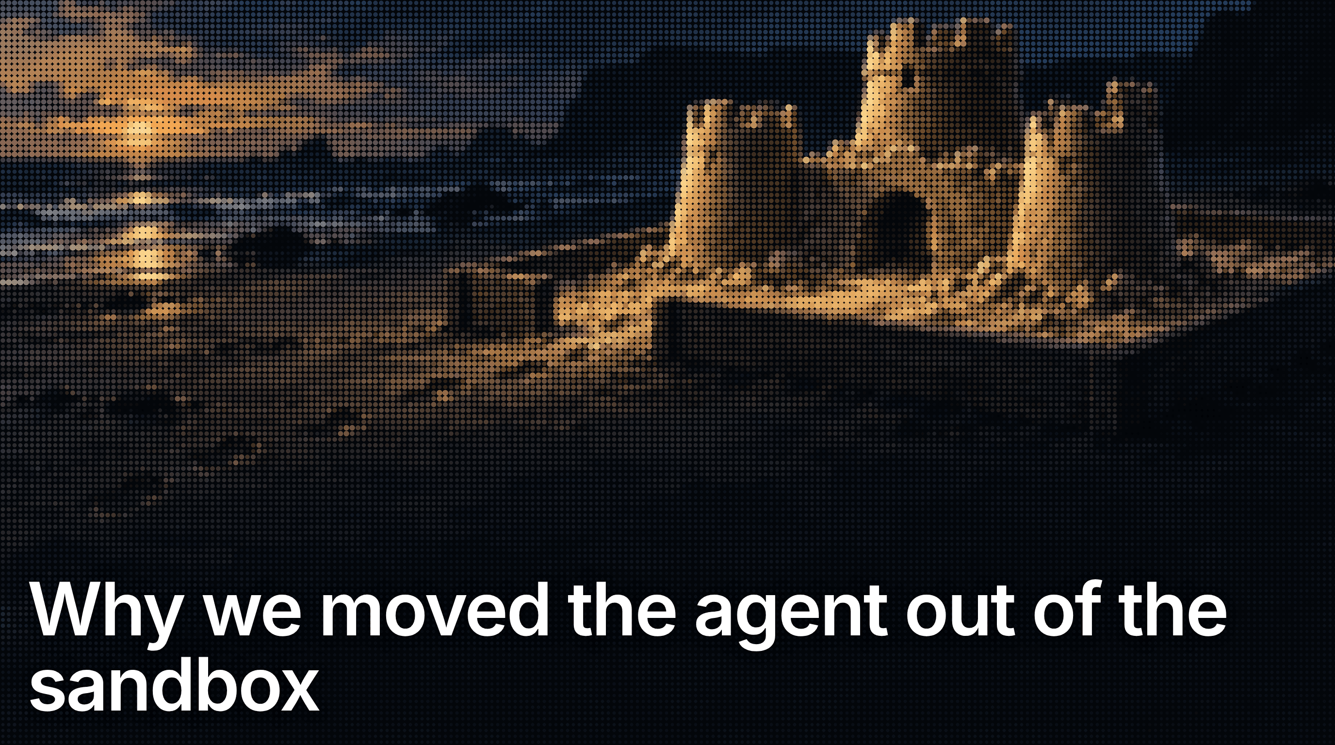 A sandcastle in an open wooden sandbox, with footprints leading onto the beach